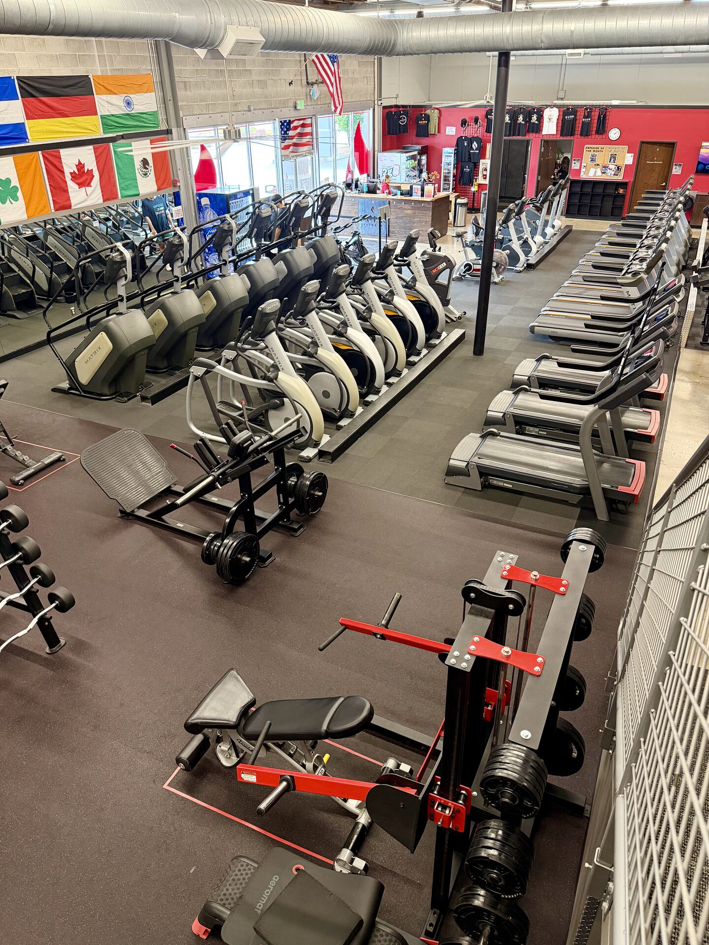 Rows of Matrix treadmills, ellipticals and stair climbers on the cardio floor